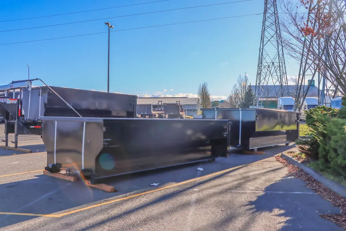 Roll-off dumpster ready for waste disposal at job site for Commercial Dumpster Rental in Palm Bay